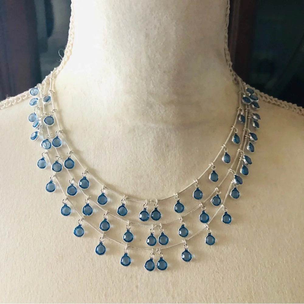 Vintage Anne Klein lion triple strand framed blue crystal dangle necklace